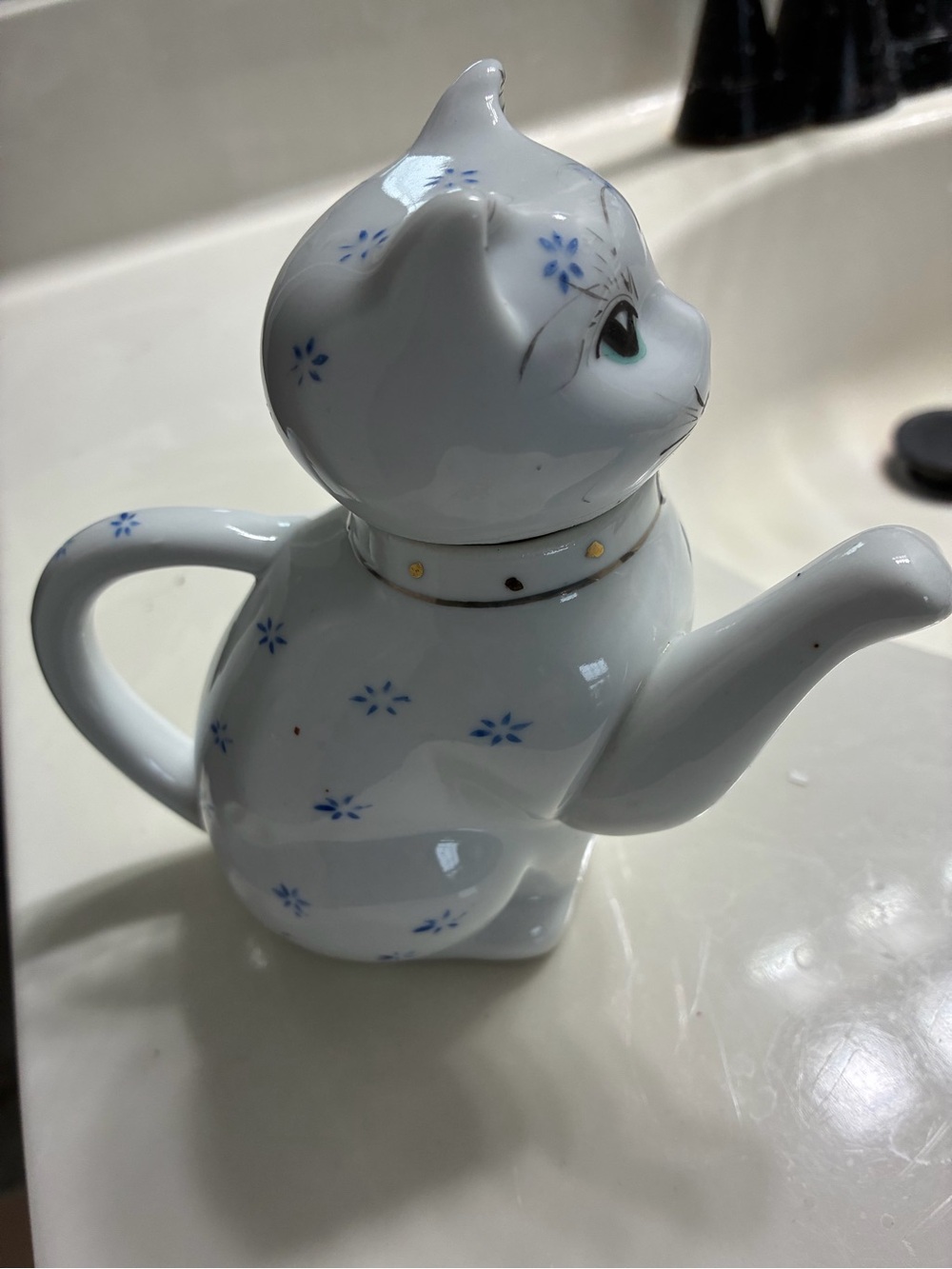 White Ceramic Cat Teapot with Blue Floral Details
